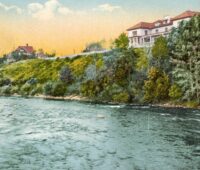 Postcard of homes on Truckee River in Reno NV