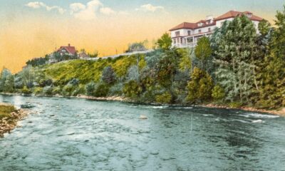 Postcard of homes on Truckee River in Reno NV