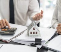 Business people signing contract making deal with real estate agent