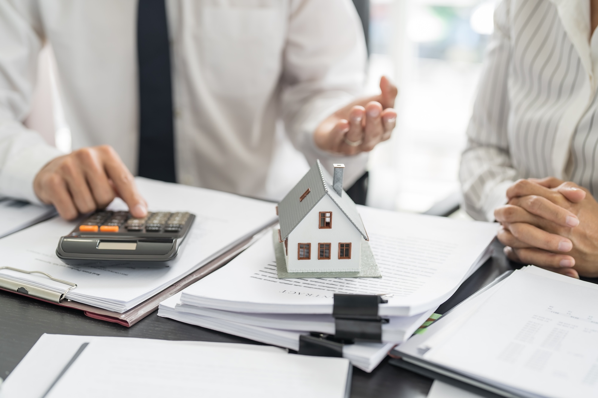 Business people signing contract making deal with real estate agent